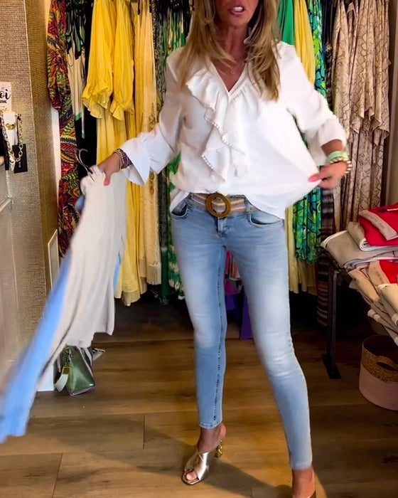 Designerbluser med volang for kvinner