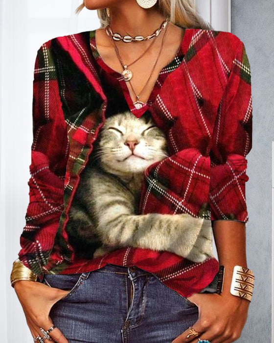 Topp med kattepaneler og lange ermer