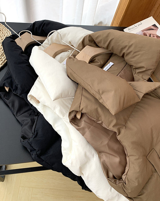 Enkel ensfarget glidelåslomme ermeløs polstret jakke