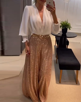 Elegant ensfarget bluse med V-hals med lanterne