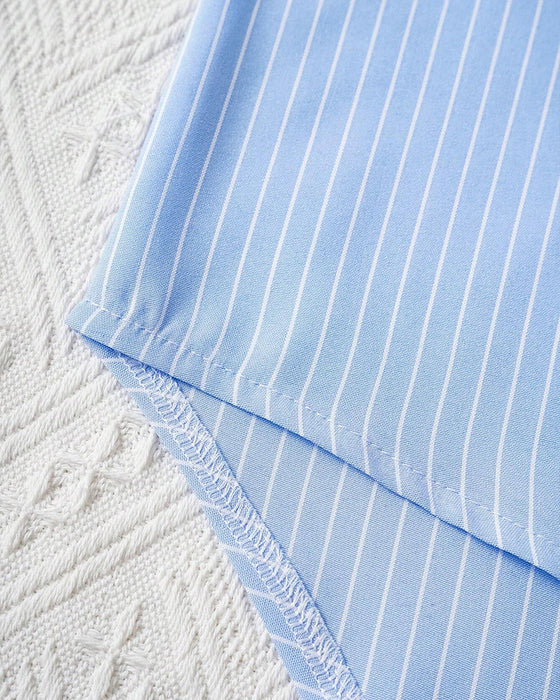 Avslappet topp med stripete trykk med rund hals