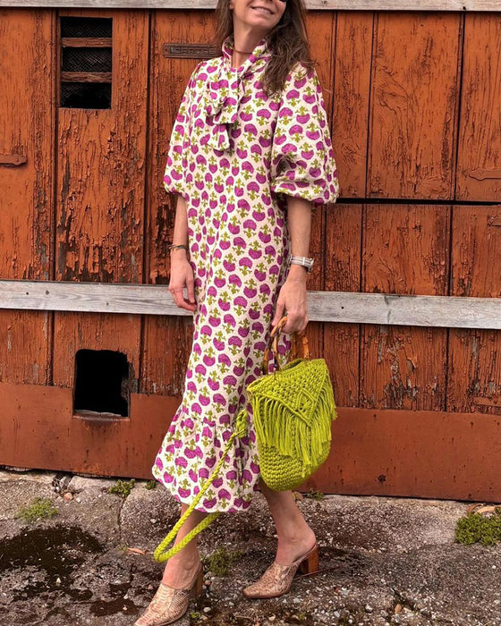 Elegant kjole med puffermer