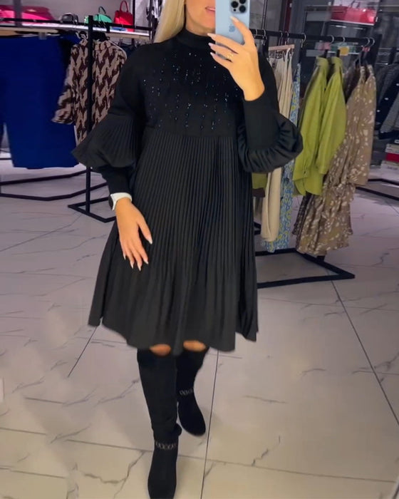 Kjole med ballongermer og ståkrage