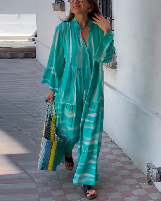 Uformell, løs lang kjole med V-hals og flare ermer