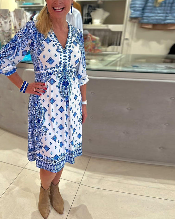 Elegant midikjole med V-hals