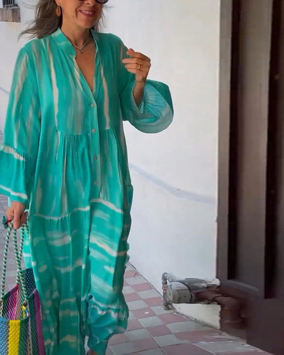 Uformell, løs lang kjole med V-hals og flare ermer