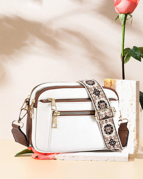 Multifunksjonell crossbody-veske med glidelås