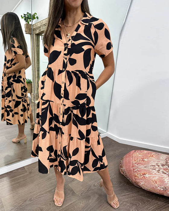 Kjole med lommer og jakkeslag og trykk