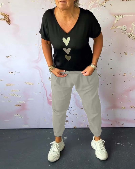 Ensfarget lommekomfort casual bukser