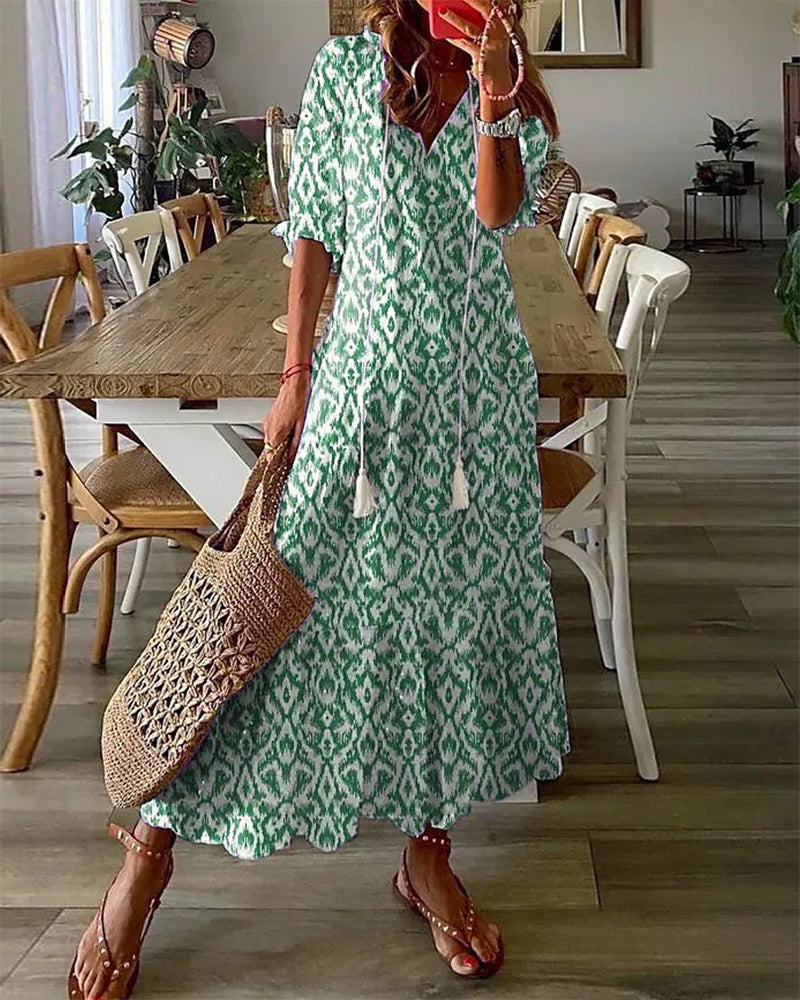 Maxi kjole med V-hals i trykk – kledegfint