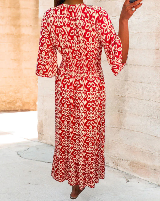 Maxikjole med rød trykk