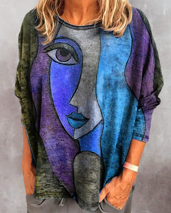 Langermet topp med ansiktstrykk