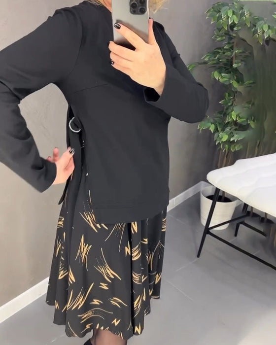 Løs og avslappet printkjole med rund hals