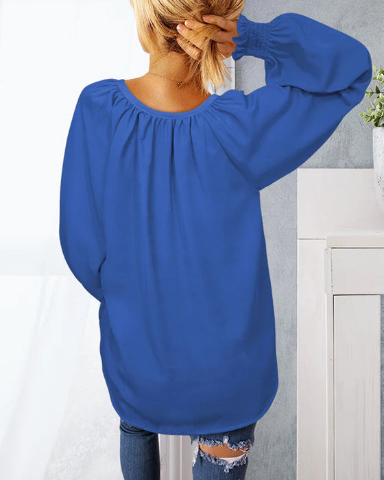 V-halset topp med elastiske mansjetter