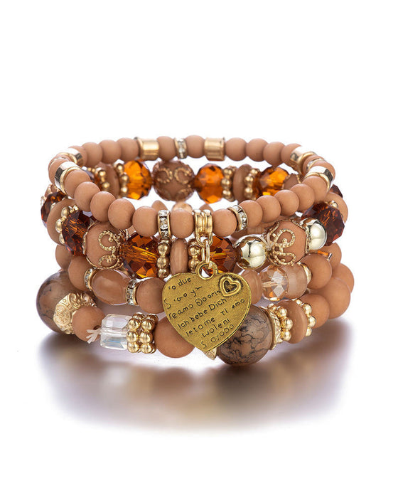 Lagdelt hjerteperlearmbånd