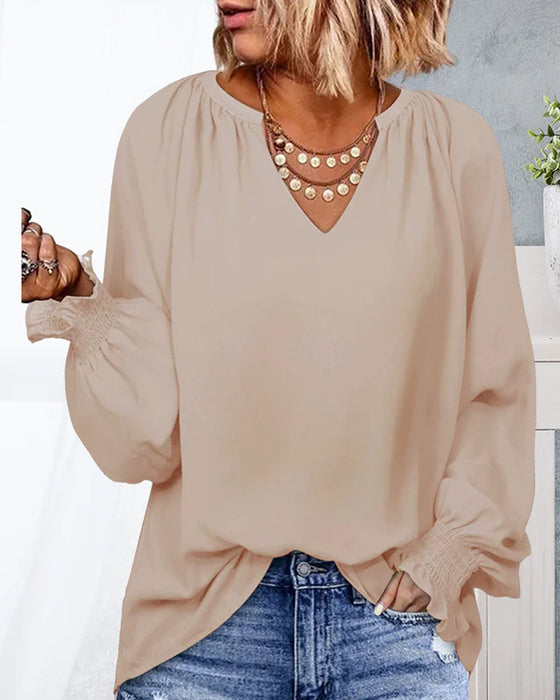 V-halset topp med elastiske mansjetter