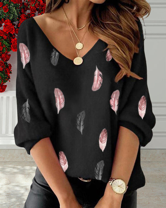 Langermet topp med bokstav- og fjærtrykk