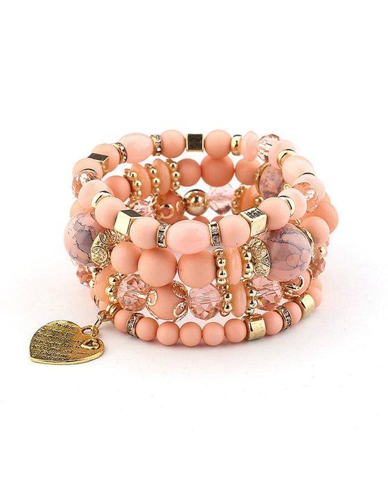 Lagdelt hjerteperlearmbånd