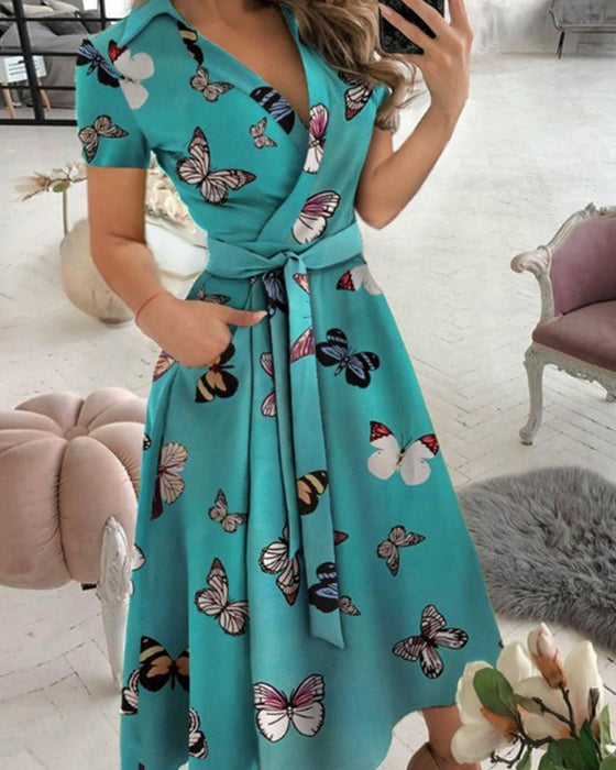 Elegant kjole med korte ermer