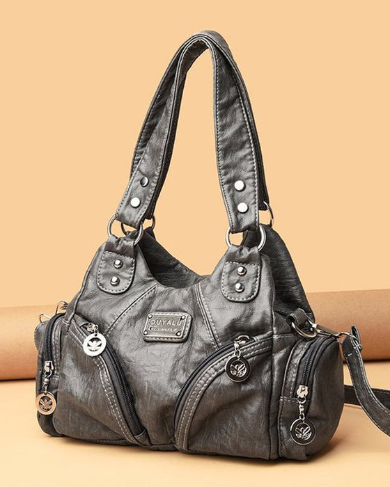 Vintage messenger bag i mykt skinn