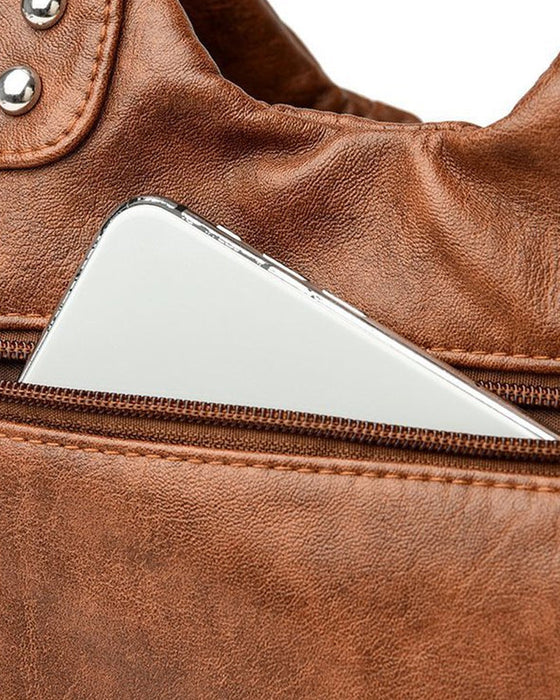 Vintage messenger bag i mykt skinn