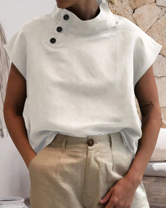 Topp med knapper og stativkrage i bomull og lin