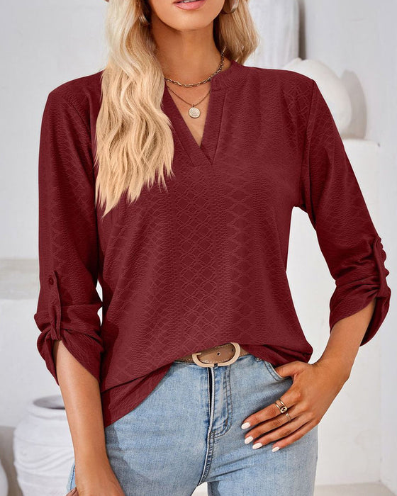 Elegant damebluse med V-hals