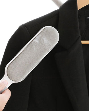 Hårfjerningsbørste til klær