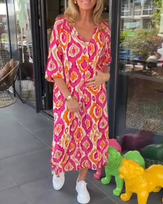 Kjole i motetrykk med halv erme