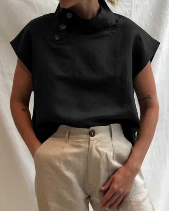 Topp med knapper og stativkrage i bomull og lin