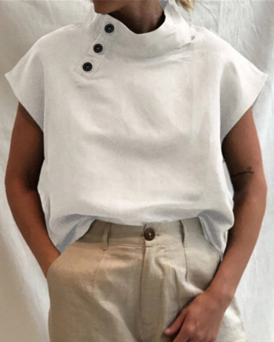 Topp med knapper og stativkrage i bomull og lin