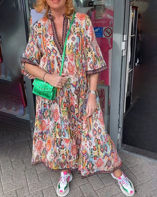 Elegant lang kjole med V-hals