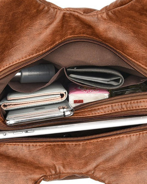 Vintage messenger bag i mykt skinn