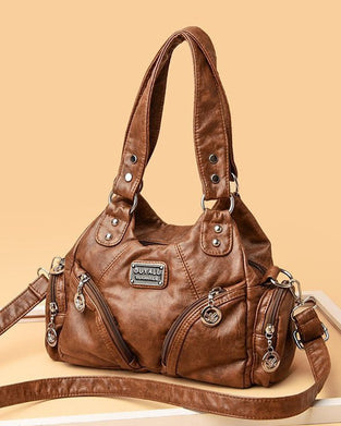 Vintage messenger bag i mykt skinn