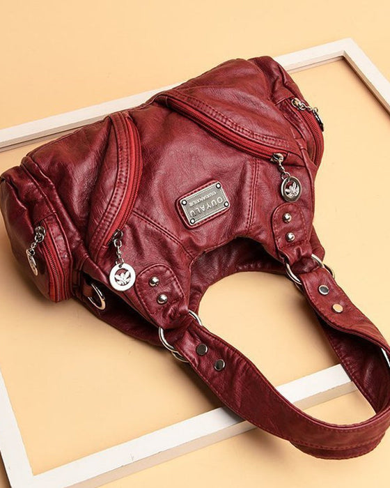 Vintage messenger bag i mykt skinn