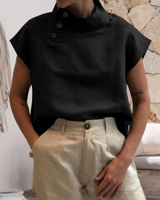 Topp med knapper og stativkrage i bomull og lin