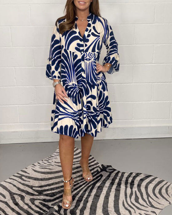 V-hals avslappet kjole med trykk