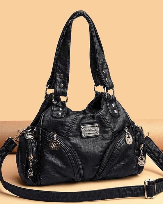 Vintage messenger bag i mykt skinn