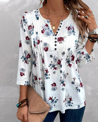 Elegant bluse med knapper med blomstertrykk