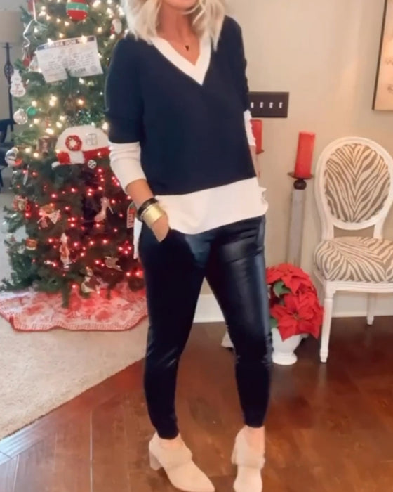 Avslappet topp i fargeblokk v-hals