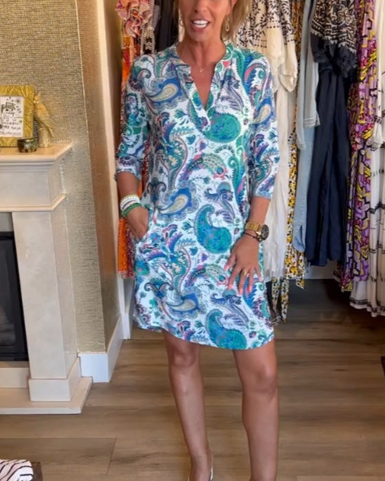 Kjole med 3/4-ermer og lommer