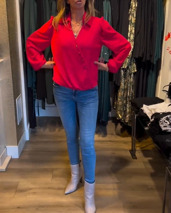 Elegant bluse med lanterneermer