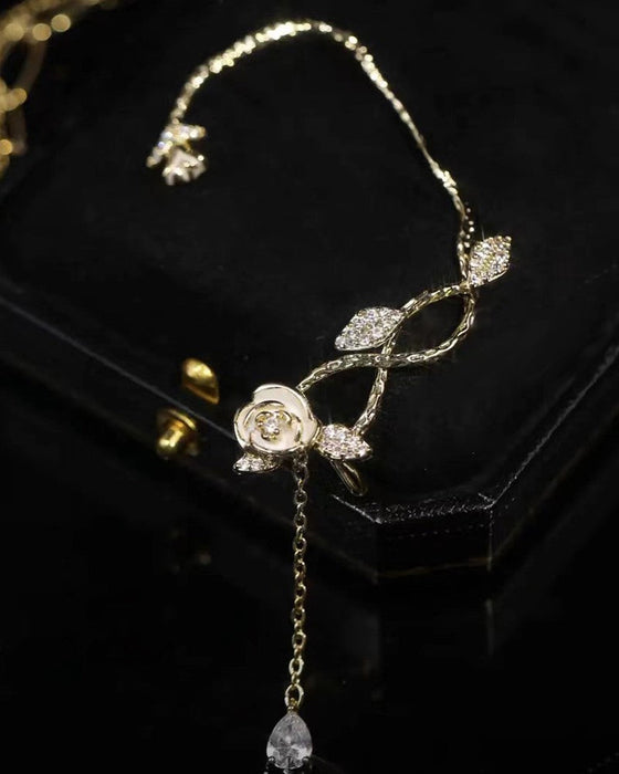 1 stk rhinestone blomsterbladmønster dusk øreklatrer