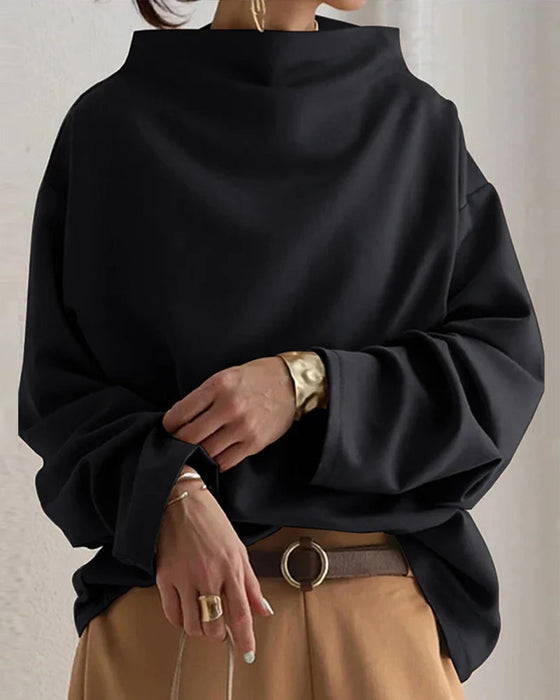 Bluse med løs passform og lange ermer