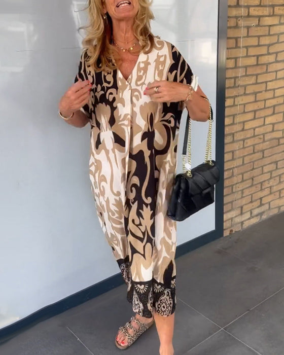 V-hals kjole med geometrisk trykk