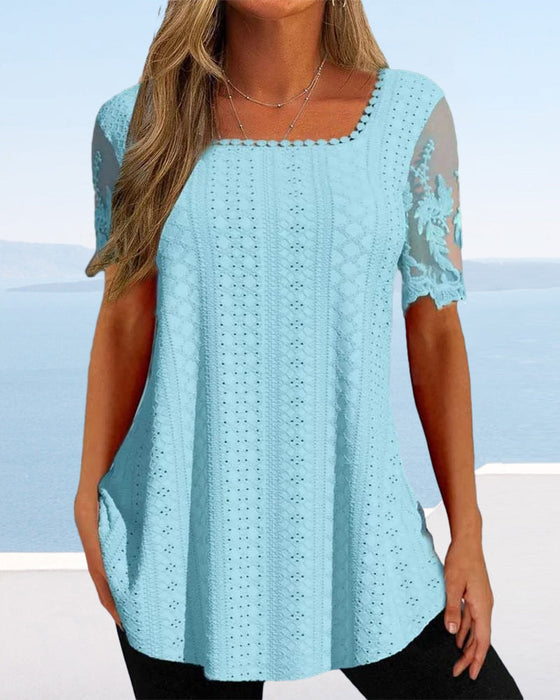 Hul broderibluse i kortermet