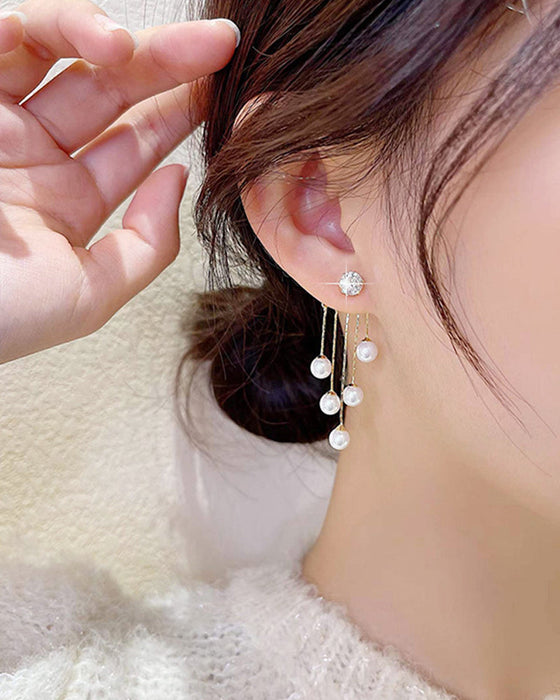 Dusk lange øredobber