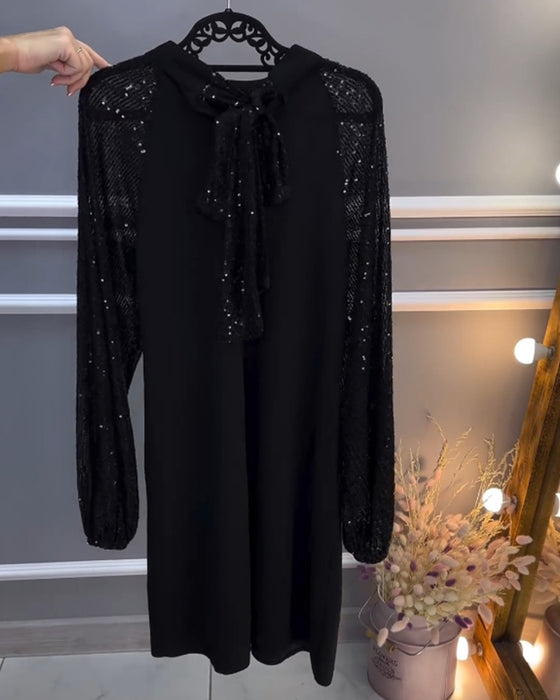 Ensfarget kjole med patchwork-ermer