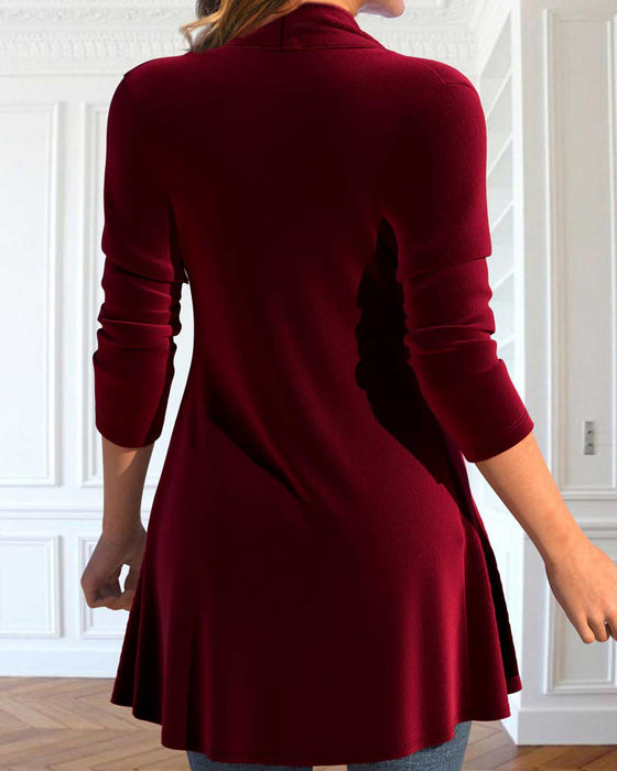 Topp med lappeteppe og paljetter og volanger