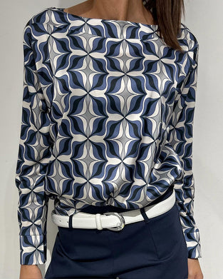 Topp med lange ermer og blomstermønster